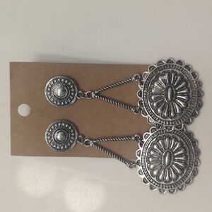 Silver, dangle earrings from Dallas TX